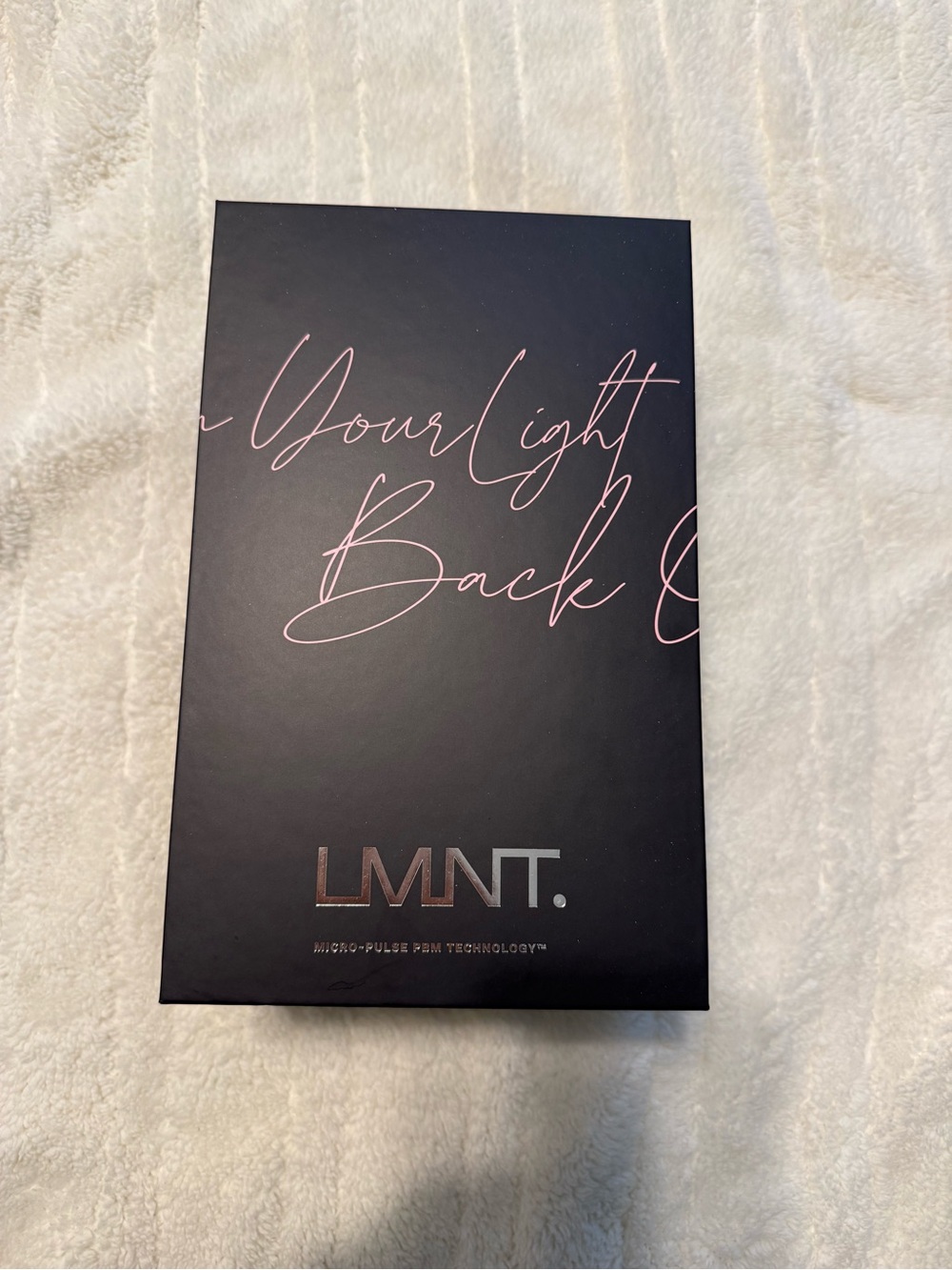 LMNT Black & Rose-Gold Acne Care Device Packaging